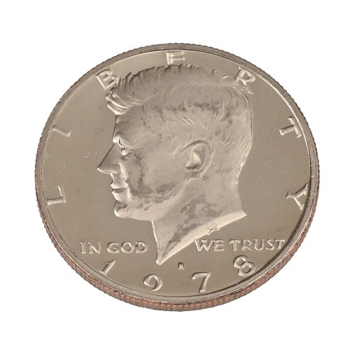 1978 Kennedy half dollar filled die error showing partially closed letter or digit in the inscription